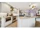 Bright kitchen features stainless steel appliances, marble countertops, and an open design at 1432 50Th Ne Ave, St Petersburg, FL 33703
