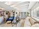 Stylish living room with comfortable seating and access to the open concept kitchen at 1432 50Th Ne Ave, St Petersburg, FL 33703