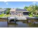 Charming waterfront home with a private boat dock and solar panels, perfect for enjoying waterfront living at 1432 50Th Ne Ave, St Petersburg, FL 33703