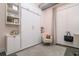 Bedroom with a built in Murphy bed, plush seating and ample storage space, optimizing the room's functionality at 1501 W Horatio St # 101, Tampa, FL 33606