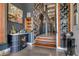 Hallway with decorative wallpaper, liquor cabinet, and wine rack at 1501 W Horatio St # 101, Tampa, FL 33606