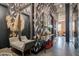 Hallway with decorative wallpaper, decorative mirror, and seating at 1501 W Horatio St # 101, Tampa, FL 33606