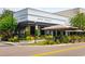 Stylish Meat Market restaurant exterior with outdoor seating, lush landscaping, and inviting ambiance at 1501 W Horatio St # 101, Tampa, FL 33606