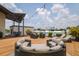 Stylish rooftop deck with lounge seating, dining area, and city views, perfect for entertaining or relaxing at 1501 W Horatio St # 101, Tampa, FL 33606