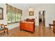 Bright dining room with a view to kitchen and large window showcasing the landscape at 15234 Scanio Dr, Spring Hill, FL 34610