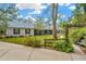 Charming single-story home with a lush front yard and a welcoming walkway at 15234 Scanio Dr, Spring Hill, FL 34610