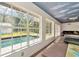 Bright room with pool view, showing natural light and outdoor living at 15234 Scanio Dr, Spring Hill, FL 34610