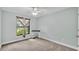 Simple bedroom featuring a window, keyboard, neutral paint, and carpet at 1901 Paddock Dr, Plant City, FL 33566