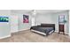 Spacious bedroom featuring neutral paint, modern decor, and carpeted floors at 1901 Paddock Dr, Plant City, FL 33566