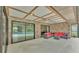 Covered patio featuring brick columns, patio furniture, and access to the pool at 1901 Paddock Dr, Plant City, FL 33566