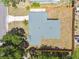 Aerial shot of home showing the backyard fence line and mature trees at 1905 E Broad St, Tampa, FL 33610