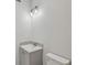 Bathroom with a gray vanity and modern lighting fixture at 1905 E Broad St, Tampa, FL 33610