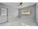 Bedroom with a window, ceiling fan and marble flooring at 1905 E Broad St, Tampa, FL 33610