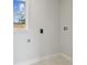 Laundry room with white marble floors and hookups at 1905 E Broad St, Tampa, FL 33610