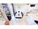 Well-lit dining area with elegant table, stylish chairs, and convenient access to the modern kitchen at 191 Brofield St, Brooksville, FL 34604
