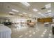 Bright and spacious community room with tables and chairs, perfect for gatherings at 2003 Greenbriar Blvd # 8, Clearwater, FL 33763