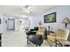 Open concept living space with a dining area, filled with natural light and stylish furnishings at 2003 Greenbriar Blvd # 8, Clearwater, FL 33763