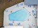 Aerial view of the pool and outdoor lounge area with plentiful seating for relaxation at 2003 Greenbriar Blvd # 8, Clearwater, FL 33763