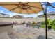 Backyard includes a paver patio with a hot tub, fire pit, and comfortable seating at 20108 Stone Pine Cir, Lutz, FL 33558