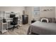 A video game themed bedroom features desk with computer, shelving, bed, and black dresser at 20108 Stone Pine Cir, Lutz, FL 33558