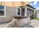 Backyard patio includes a modern hot tub for relaxation and enjoyment at 20108 Stone Pine Cir, Lutz, FL 33558