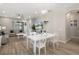 Cozy living room featuring modern decor and sliding glass doors at 20108 Stone Pine Cir, Lutz, FL 33558