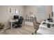 This office features a computer, printer, bookshelves, and stylish decor at 20108 Stone Pine Cir, Lutz, FL 33558