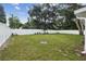 Expansive backyard with a white vinyl fence, offering privacy at 2044 Balfour Cir, Tampa, FL 33619