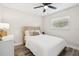 Cozy bedroom with natural wood accents, neutral decor, and lots of natural light at 2044 Balfour Cir, Tampa, FL 33619