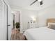 Neutrally decorated bedroom with ensuite bath, featuring modern furniture and lots of natural light at 2044 Balfour Cir, Tampa, FL 33619