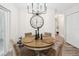 Cozy dining area with stylish chandelier and backyard access at 2044 Balfour Cir, Tampa, FL 33619