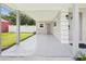 Wide angle view of single story home featuring a covered porch at 2044 Balfour Cir, Tampa, FL 33619