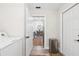 View through laundry room into dining room with table at 2044 Balfour Cir, Tampa, FL 33619