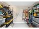 Organized storage room with shelving and ample space for tools and supplies at 2044 Balfour Cir, Tampa, FL 33619