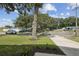 A beautiful tree provides shade in this quiet, residential neighborhood at 2044 Balfour Cir, Tampa, FL 33619