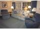 Cozy living room features plush seating and soft lighting at 2143 Wrens Way, Clearwater, FL 33764