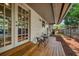 Outdoor patio area with table and chairs and a view of the fenced-in backyard at 2316 Lancaster Dr, Clearwater, FL 33764