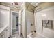 Cozy bathroom with a shower and tub and updated fixtures and finishes at 2316 Lancaster Dr, Clearwater, FL 33764