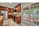 Updated kitchen with stainless appliances, ample cabinet space, and access to a private outdoor patio at 2316 Lancaster Dr, Clearwater, FL 33764
