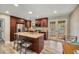 Modern kitchen with a large island, stainless steel appliances, and easy access to the outdoor area at 2316 Lancaster Dr, Clearwater, FL 33764