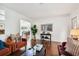 Bright and inviting living room showing hardwood floors with comfortable seating and stylish decor at 2560 51St N St, St Petersburg, FL 33710