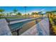Well-maintained community bocce ball courts with seating and manicured landscaping at 27132 Capri Shores Cir, Englewood, FL 34223