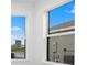 Bright interior with large windows offering natural light and serene neighborhood views at 27132 Capri Shores Cir, Englewood, FL 34223