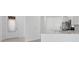 Modern kitchen with stainless steel appliances, tile backsplash, and a quartz countertop island at 27136 Capri Shores Cir, Englewood, FL 34223