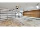 Two-car garage with automatic door openers, concrete floors and peg boards at 2719 Wilder Trace Ct, Plant City, FL 33566