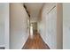 Hallway with wood floors at 2719 Wilder Trace Ct, Plant City, FL 33566