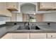 Kitchen with a view of the living room and sliding door at 2719 Wilder Trace Ct, Plant City, FL 33566