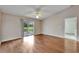 Living room with ceiling fan and sliding glass door at 2719 Wilder Trace Ct, Plant City, FL 33566