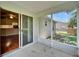 A cozy screened patio with access to the house and backyard at 2719 Wilder Trace Ct, Plant City, FL 33566