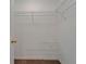 Spacious walk-in closet features carpeted floor and wire shelving at 2719 Wilder Trace Ct, Plant City, FL 33566